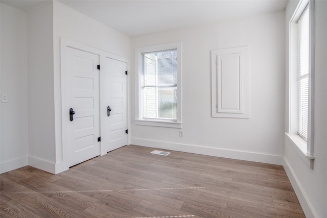 unfurnished bedroom featuring light hardwood / wood-style flooring