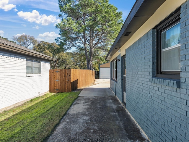 view of side of property featuring a patio