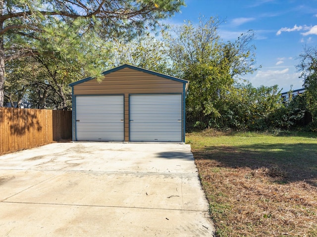 garage with a lawn