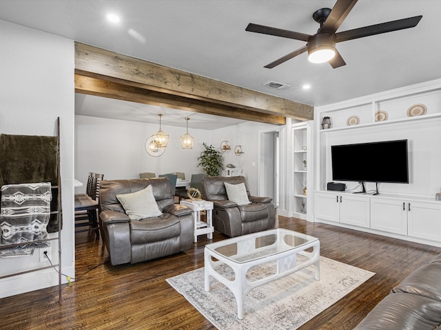 living room featuring built in shelves, ceiling fan, dark hardwood / wood-style floors, and beamed ceiling