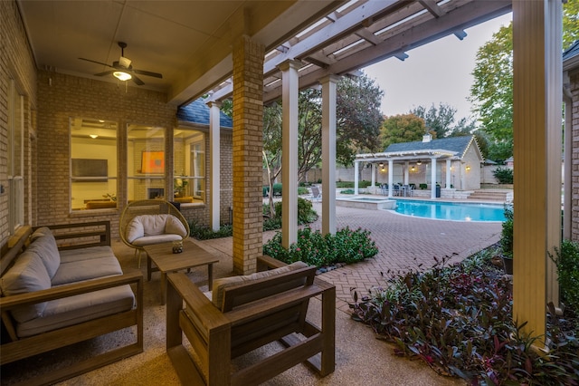 exterior space featuring ceiling fan