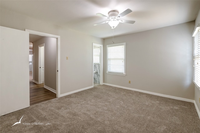 carpeted empty room with ceiling fan