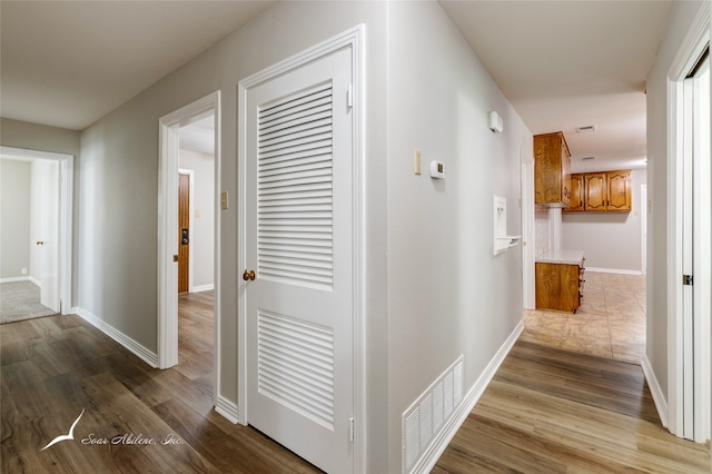 hallway featuring hardwood / wood-style floors