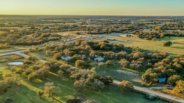 aerial view at dusk with a rural view