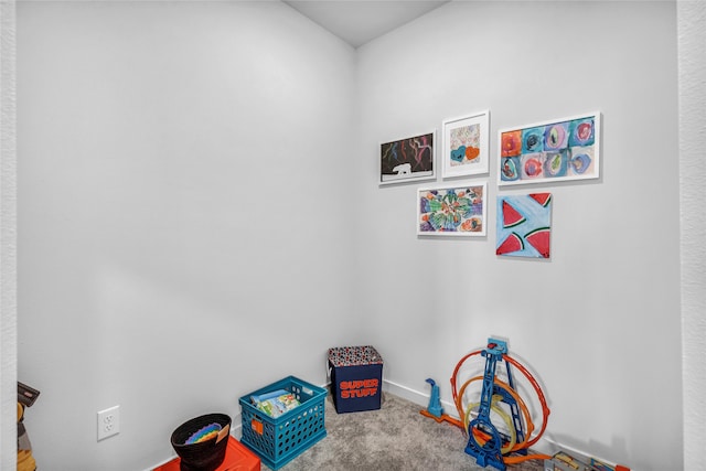 rec room with carpet flooring