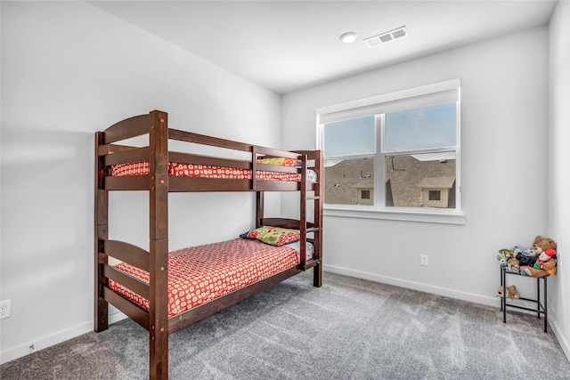 bedroom featuring carpet