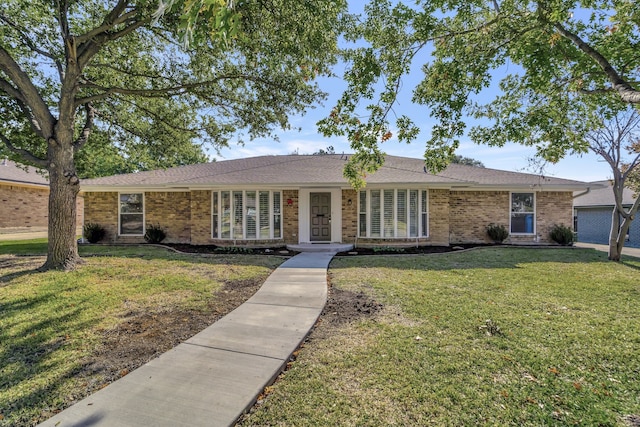 single story home featuring a front yard