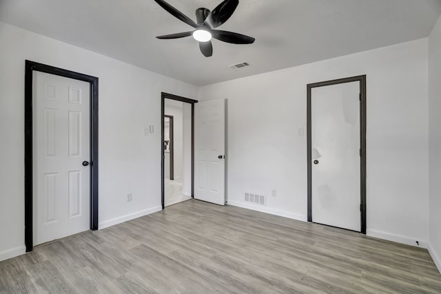 unfurnished bedroom featuring ceiling fan and light hardwood / wood-style floors