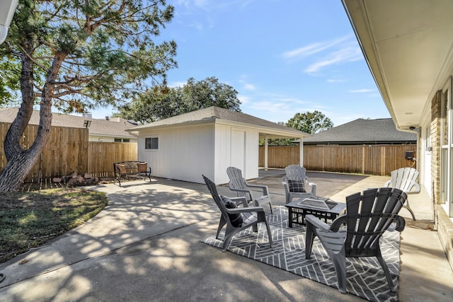 view of patio / terrace with a fire pit