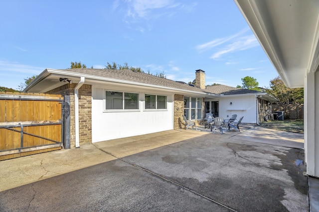 rear view of house with a patio area