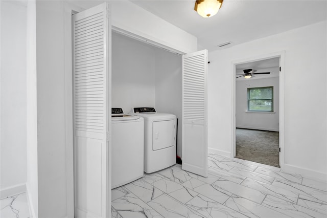 washroom with ceiling fan and washing machine and dryer