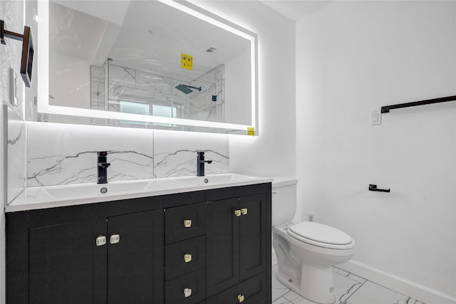 bathroom with vanity, an enclosed shower, and toilet