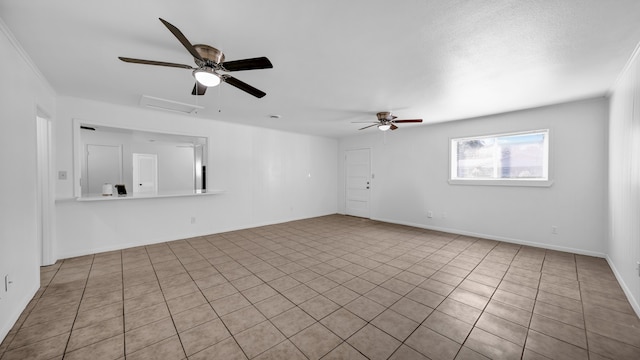 tiled empty room with ceiling fan