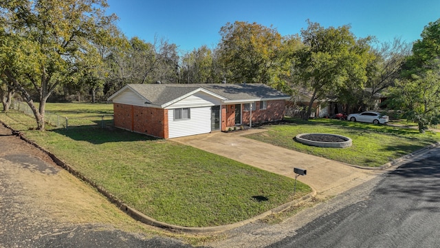 ranch-style house with a front lawn