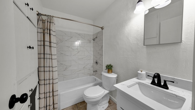 full bathroom featuring toilet, shower / bath combo with shower curtain, vanity, and tile patterned flooring