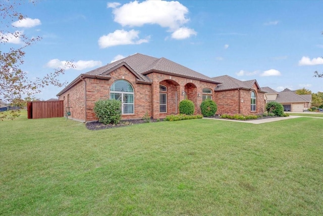 view of front of home with a front yard