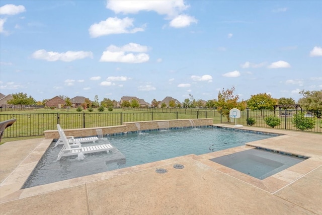 view of pool with pool water feature and an in ground hot tub