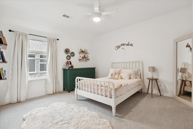 carpeted bedroom with ceiling fan and lofted ceiling