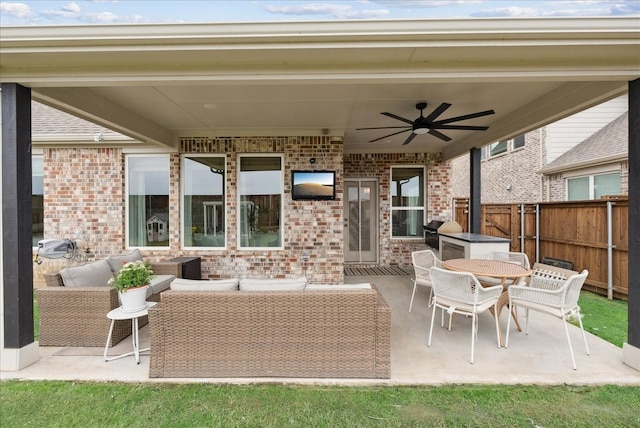 view of patio / terrace with outdoor lounge area and ceiling fan