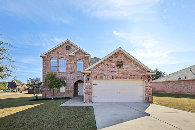 view of front property featuring a garage and a front yard