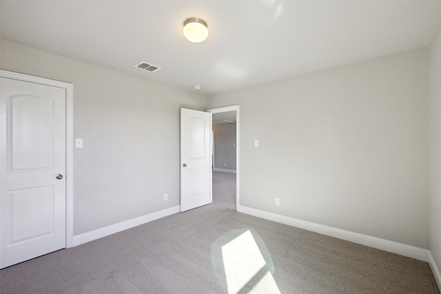 unfurnished bedroom featuring carpet floors