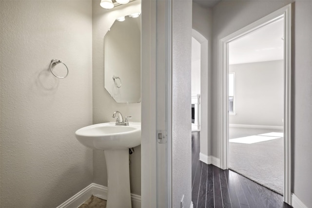 bathroom featuring hardwood / wood-style floors and sink