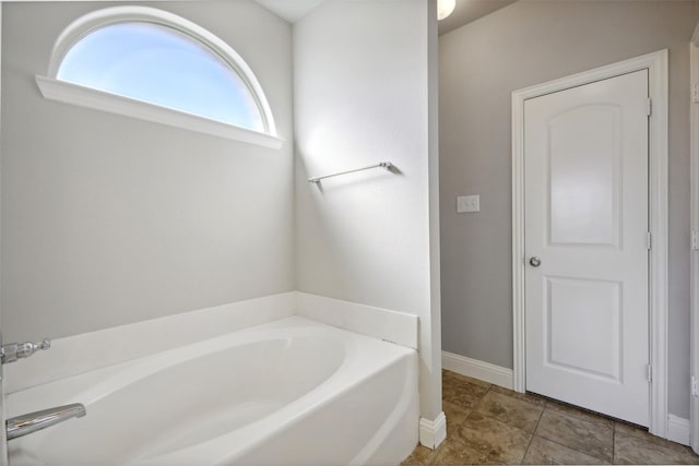 bathroom featuring a tub