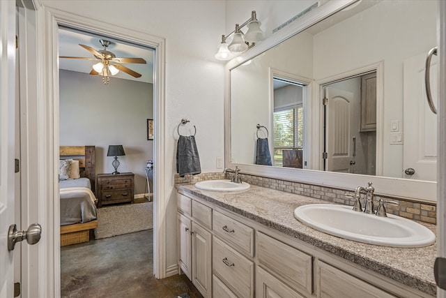 bathroom featuring ceiling fan, concrete flooring, and vanity