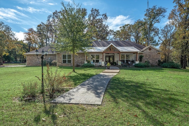 ranch-style house with a front lawn