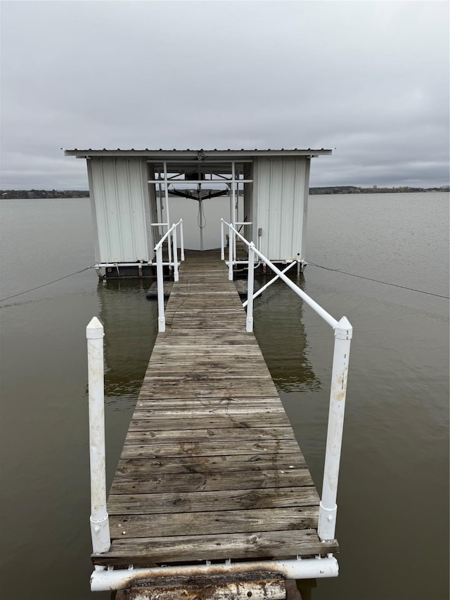 view of dock with a water view