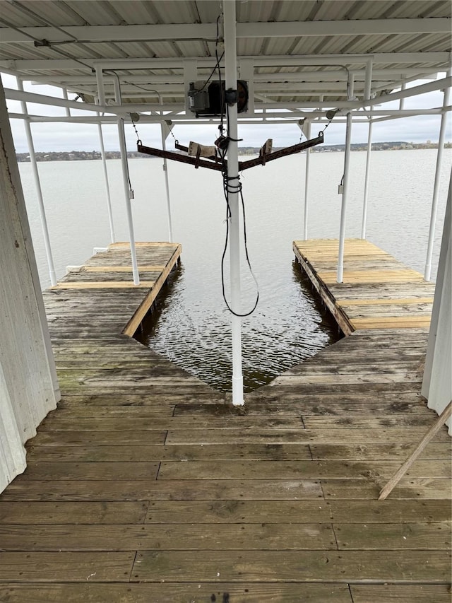 dock area featuring a water view