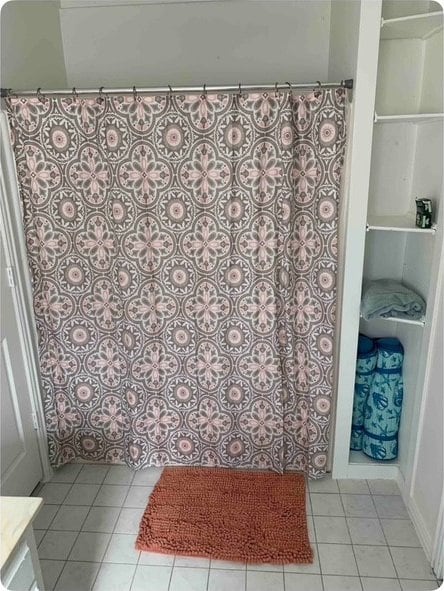 bathroom with tile patterned floors and vanity