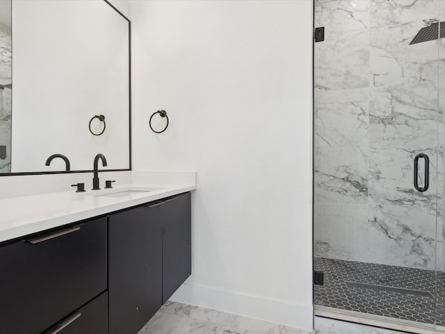 bathroom with vanity and an enclosed shower