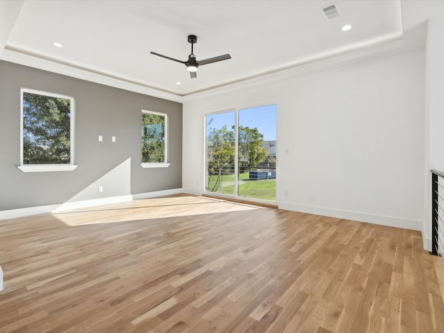 unfurnished living room with light hardwood / wood-style flooring and ceiling fan