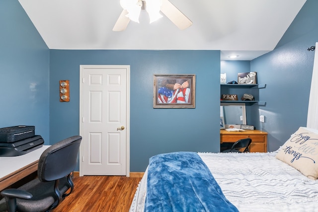 bedroom featuring dark wood finished floors and ceiling fan