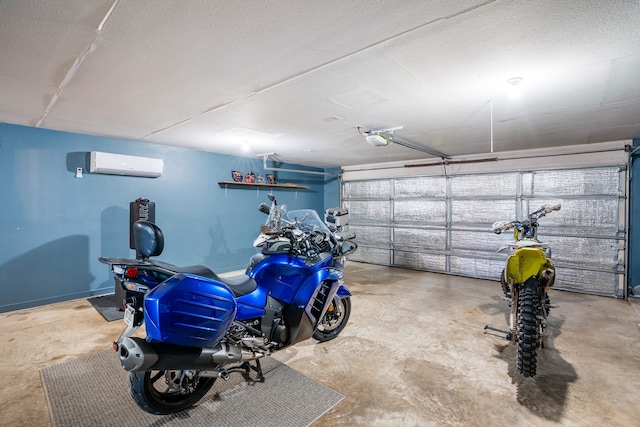 garage with a wall unit AC and a garage door opener