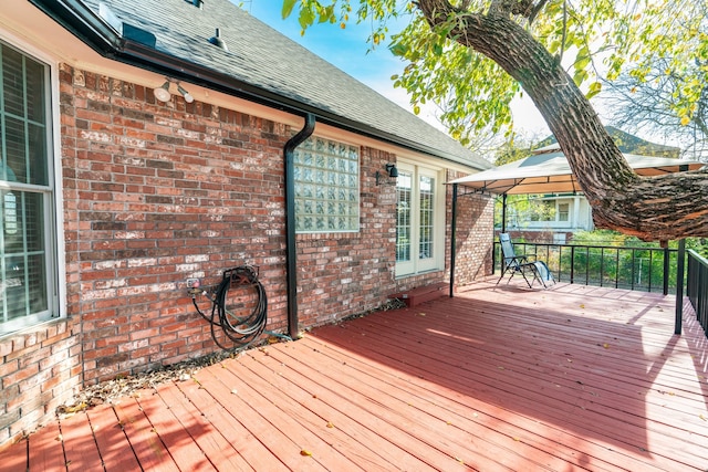 wooden deck with a gazebo