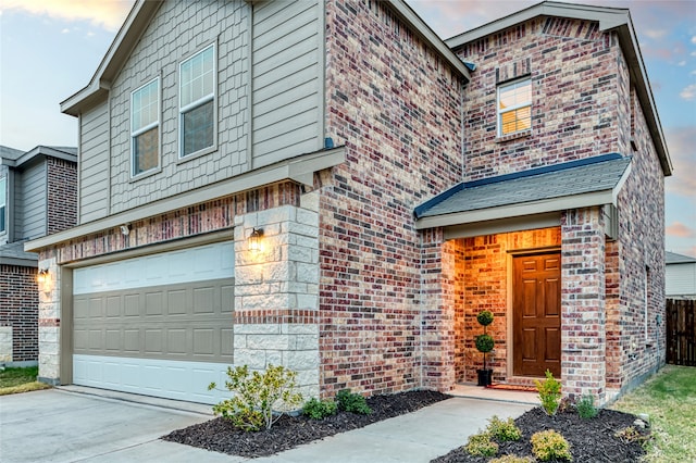 view of front property with a garage