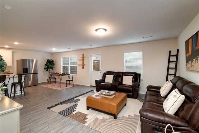 living room featuring light wood-type flooring