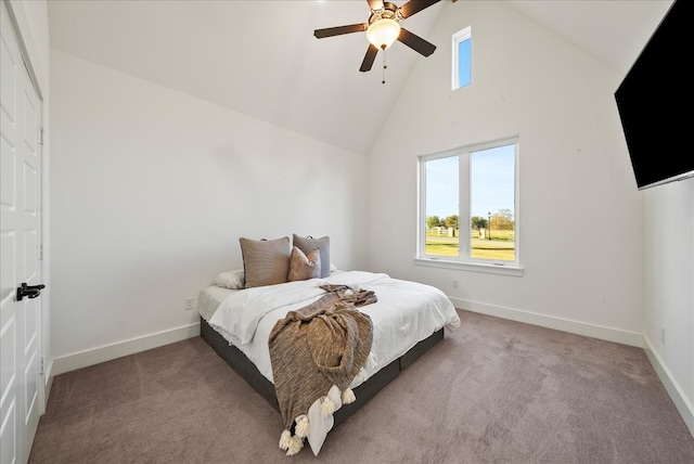 carpeted bedroom with high vaulted ceiling and ceiling fan