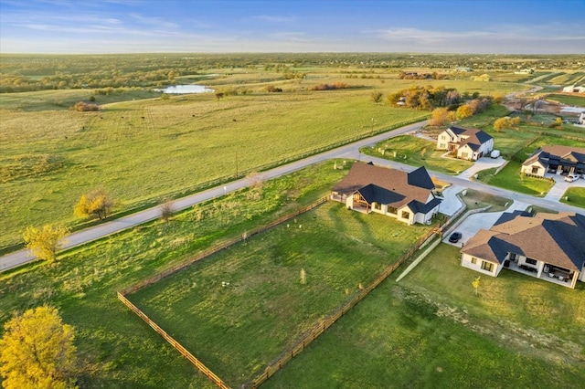 birds eye view of property featuring a rural view