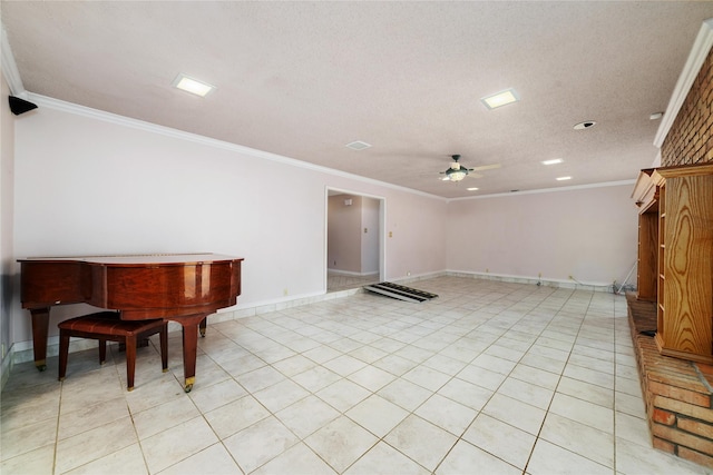 miscellaneous room featuring crown molding, light tile patterned floors, a textured ceiling, and ceiling fan