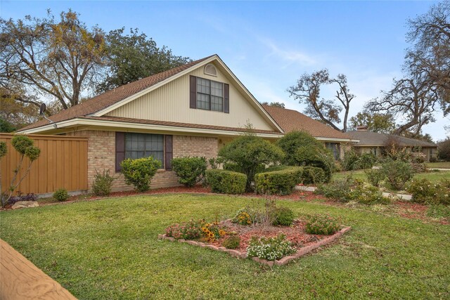 view of front of home with a front yard