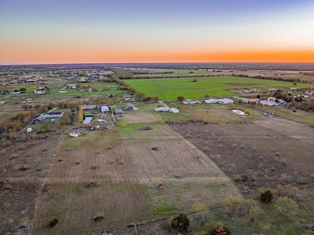 aerial view at dusk with a rural view