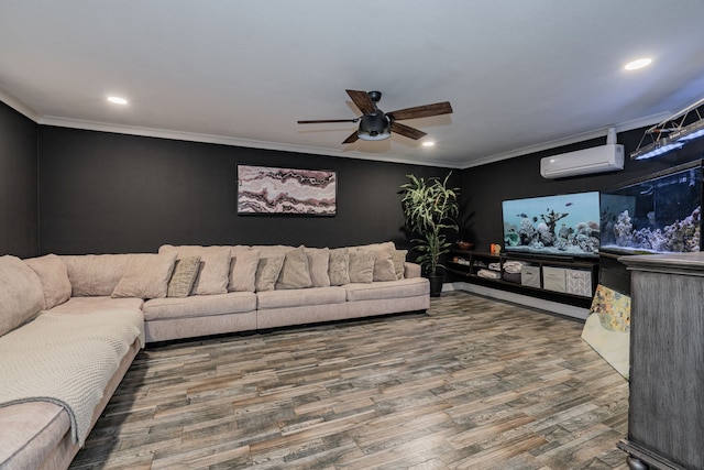 living room featuring hardwood / wood-style flooring, an AC wall unit, ceiling fan, and crown molding