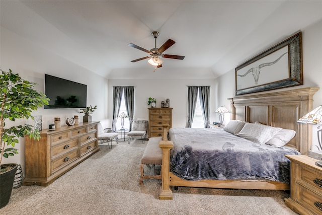 bedroom featuring light colored carpet and ceiling fan