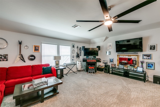 living room with carpet flooring and ceiling fan