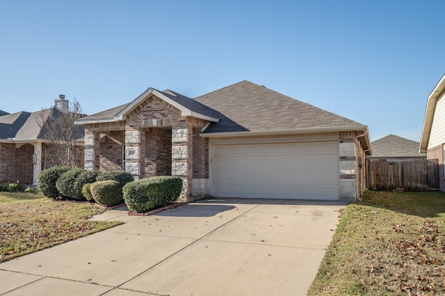 single story home with a garage