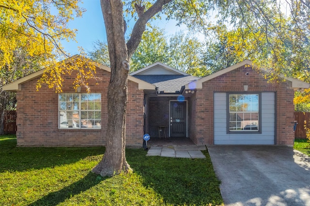 view of front of home with a front lawn