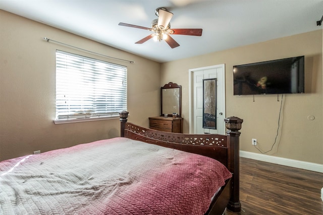 bedroom with ceiling fan and dark wood-type flooring